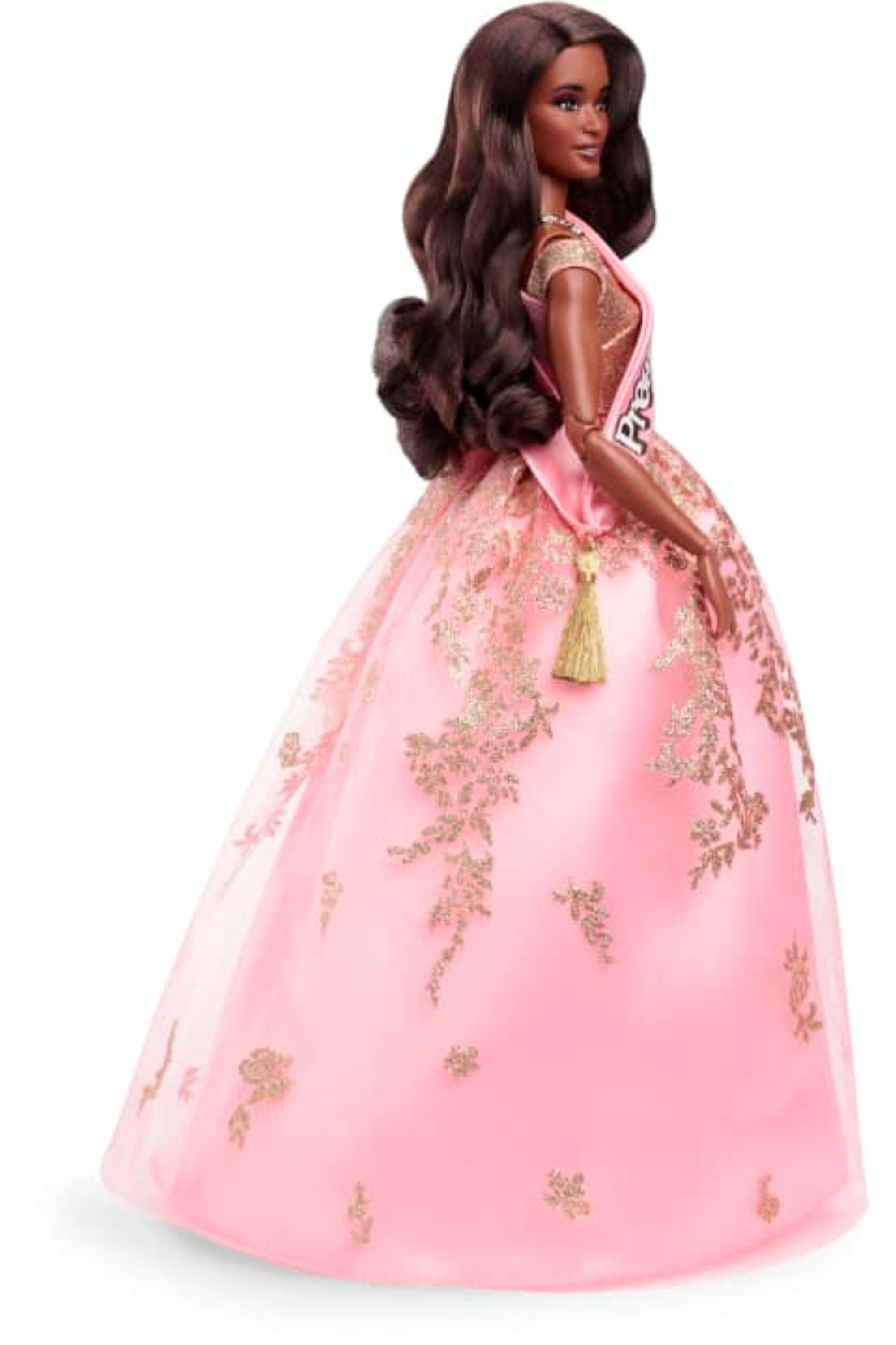 president barbie in a pink and gold dress